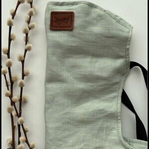HappyBaby Revolution Carrier forward facing in seafoam